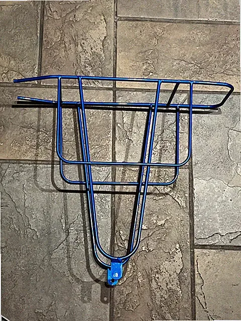 Blue rear bicycle rack is designed to fit cruiser or vintage-style bikes- NOS